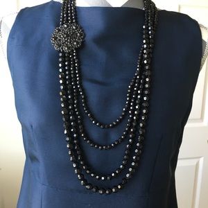 Multi-strand bead necklace